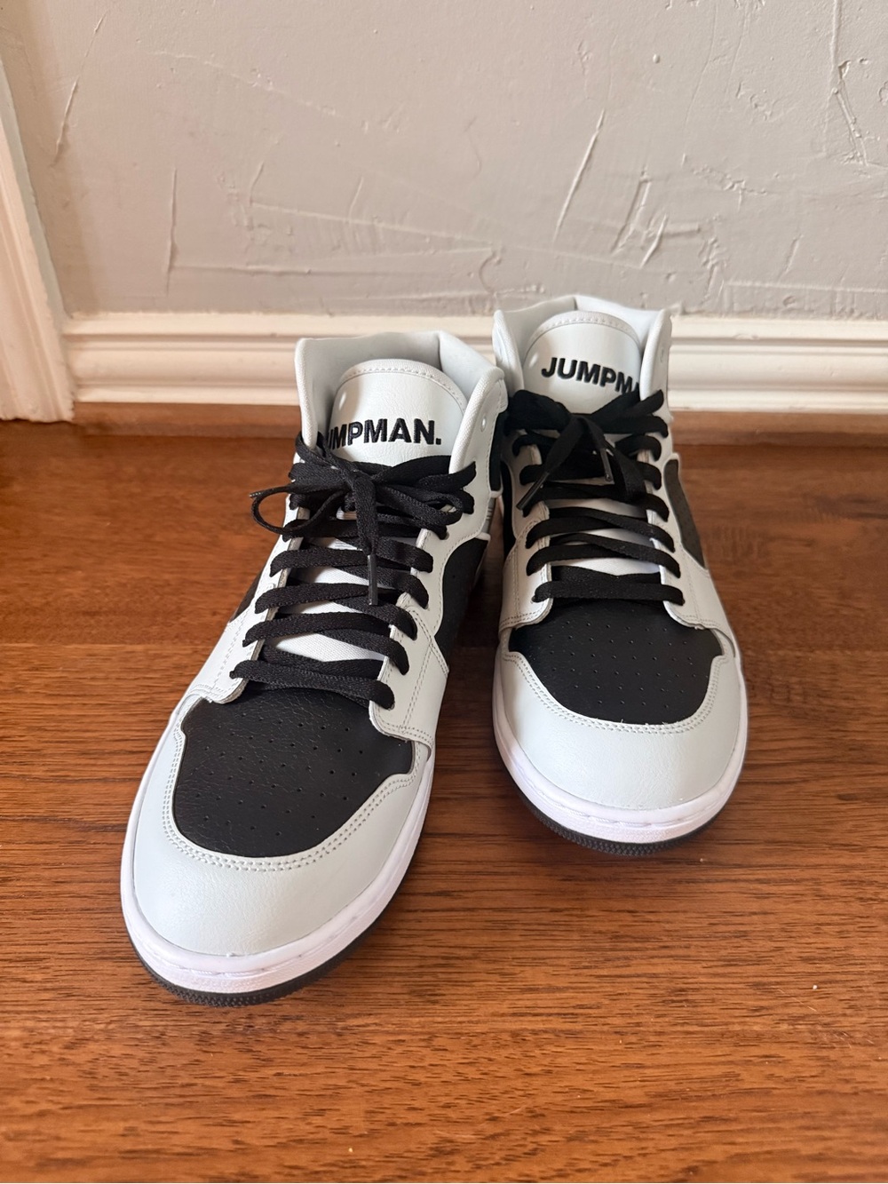 Air Jordan 1 Black and White Mid-Top Athletic Sneakers